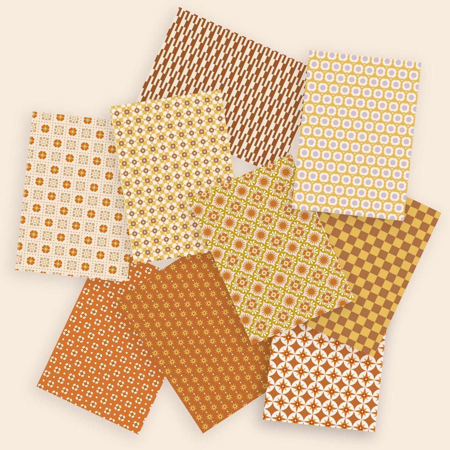 Collection of patterned paper sheets in brown and yellow tones on a beige background