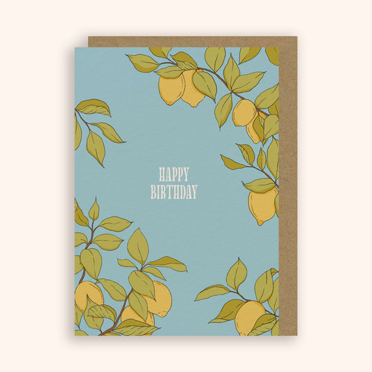 Greeting card with lemon illustrations and 'Happy Birthday' text on a blue background
