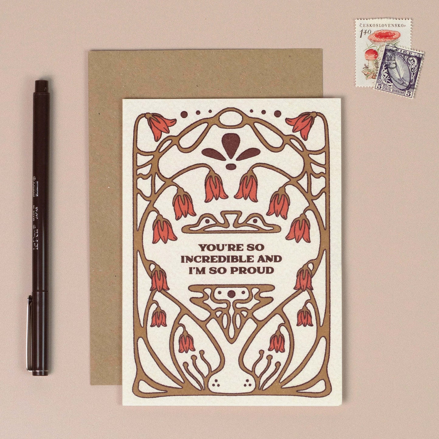 Greeting card with decorative design and text reading 'You're so Incredible and I'm So Proud' on a beige background
